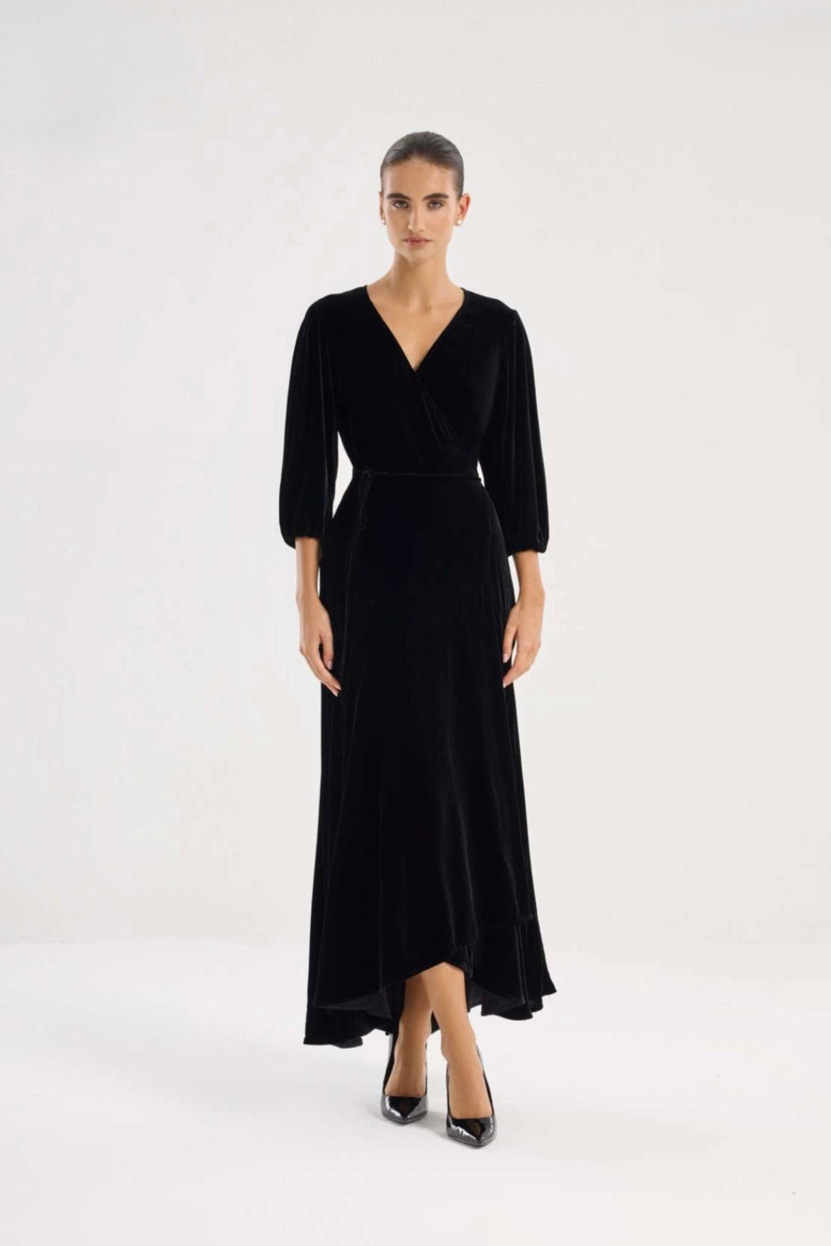 Black wrap-style midi dress with V-neckline