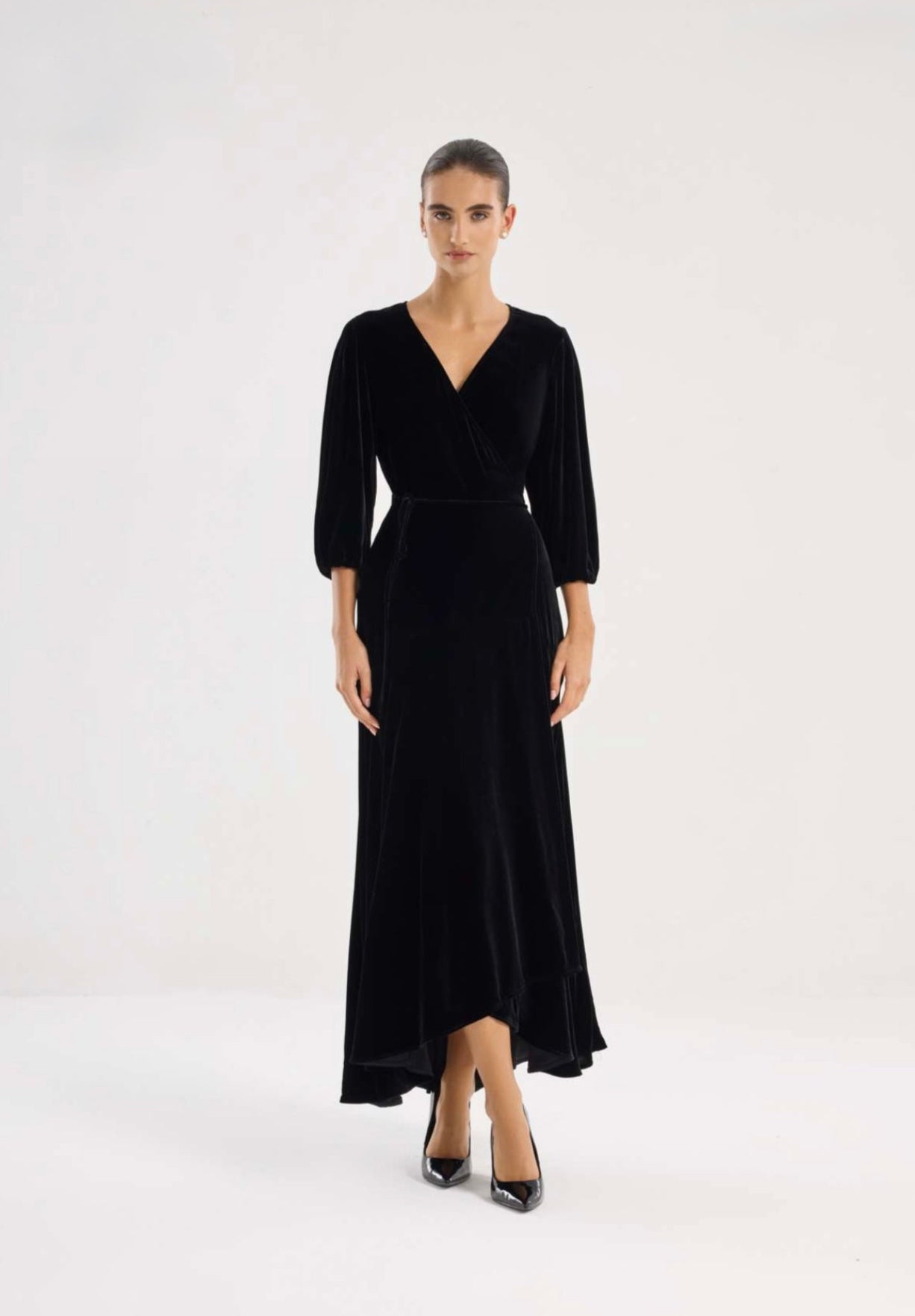 Black wrap-style midi dress with V-neckline