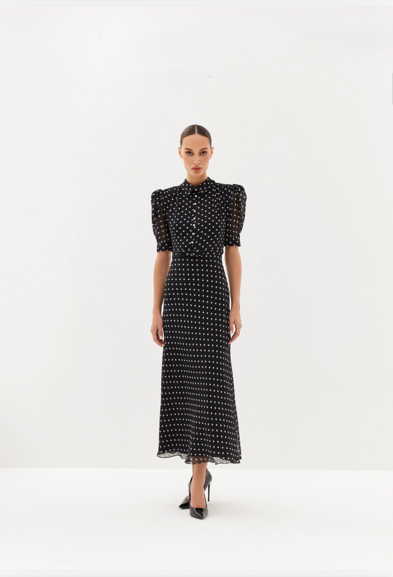 Black polka-dot midi dress with puff sleeves