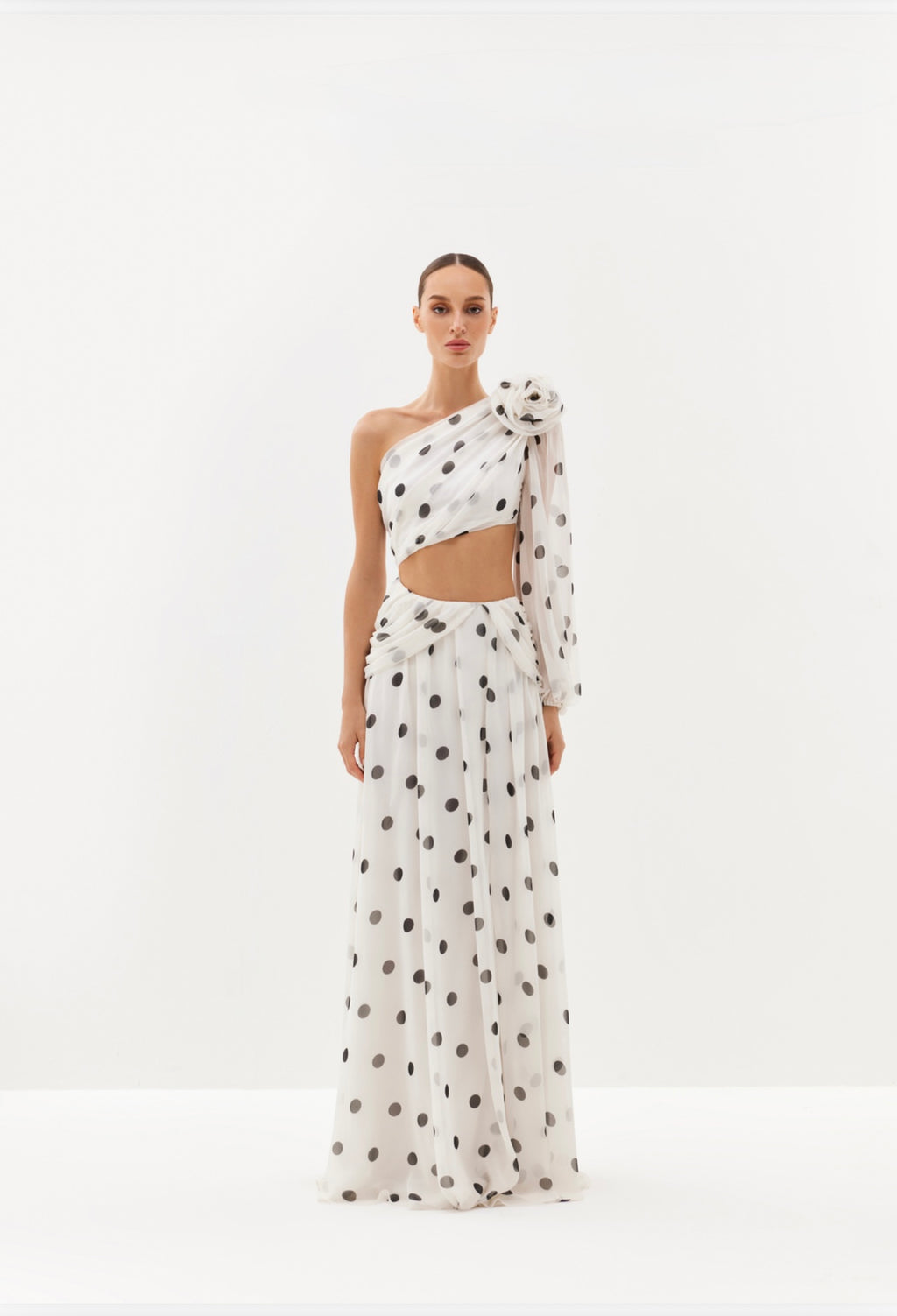 Black polka-dot one-shoulder maxi dress with sheer drape