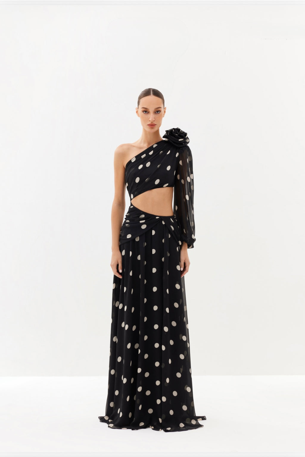 Black polka-dot one-shoulder maxi dress with sheer drape