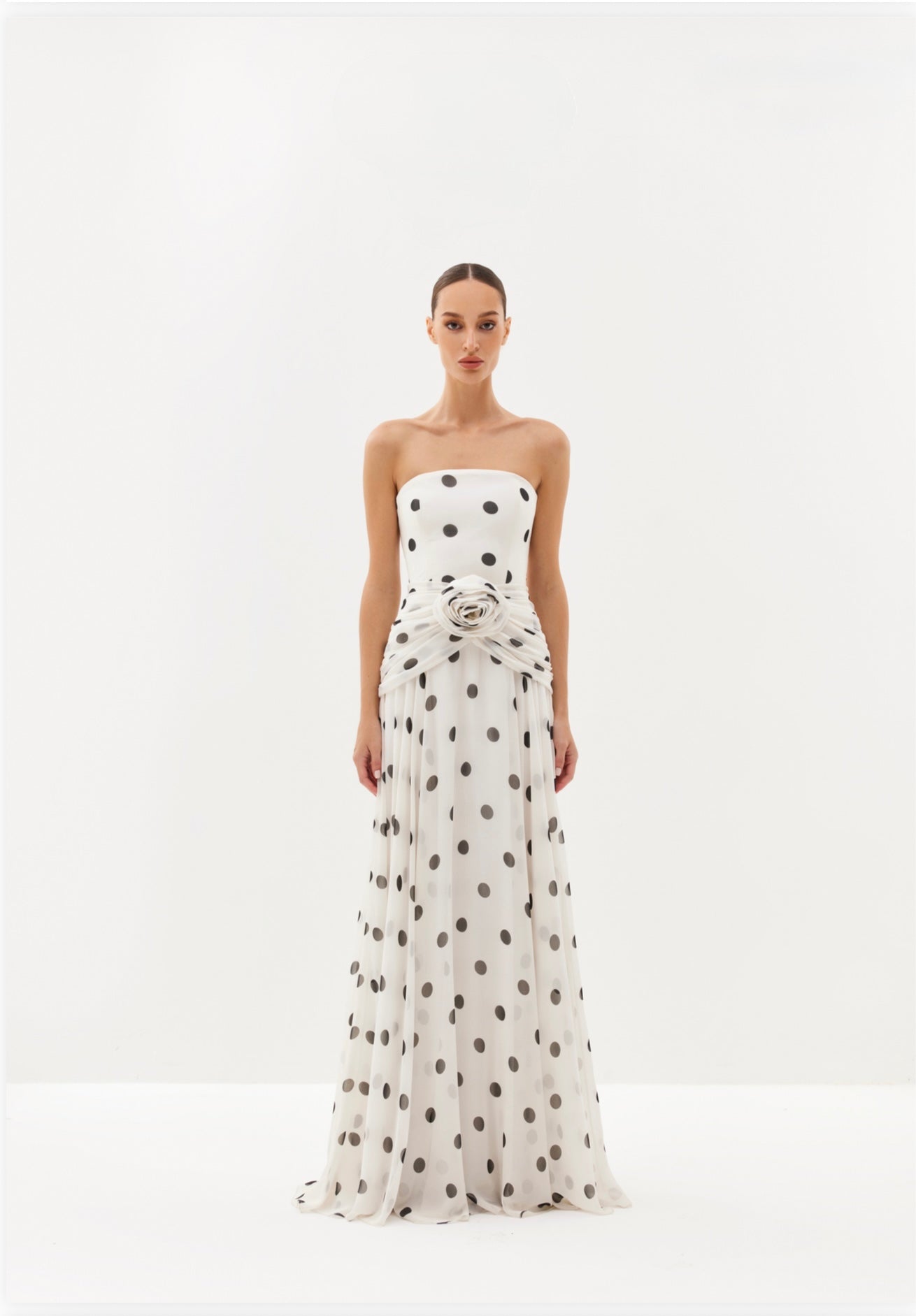 Ivory polka-dot strapless maxi dress with draped waist