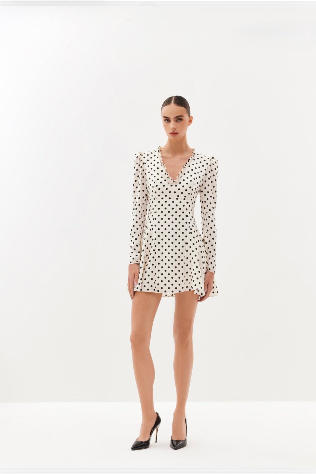 Ivory polka-dot mini dress with V-neckline