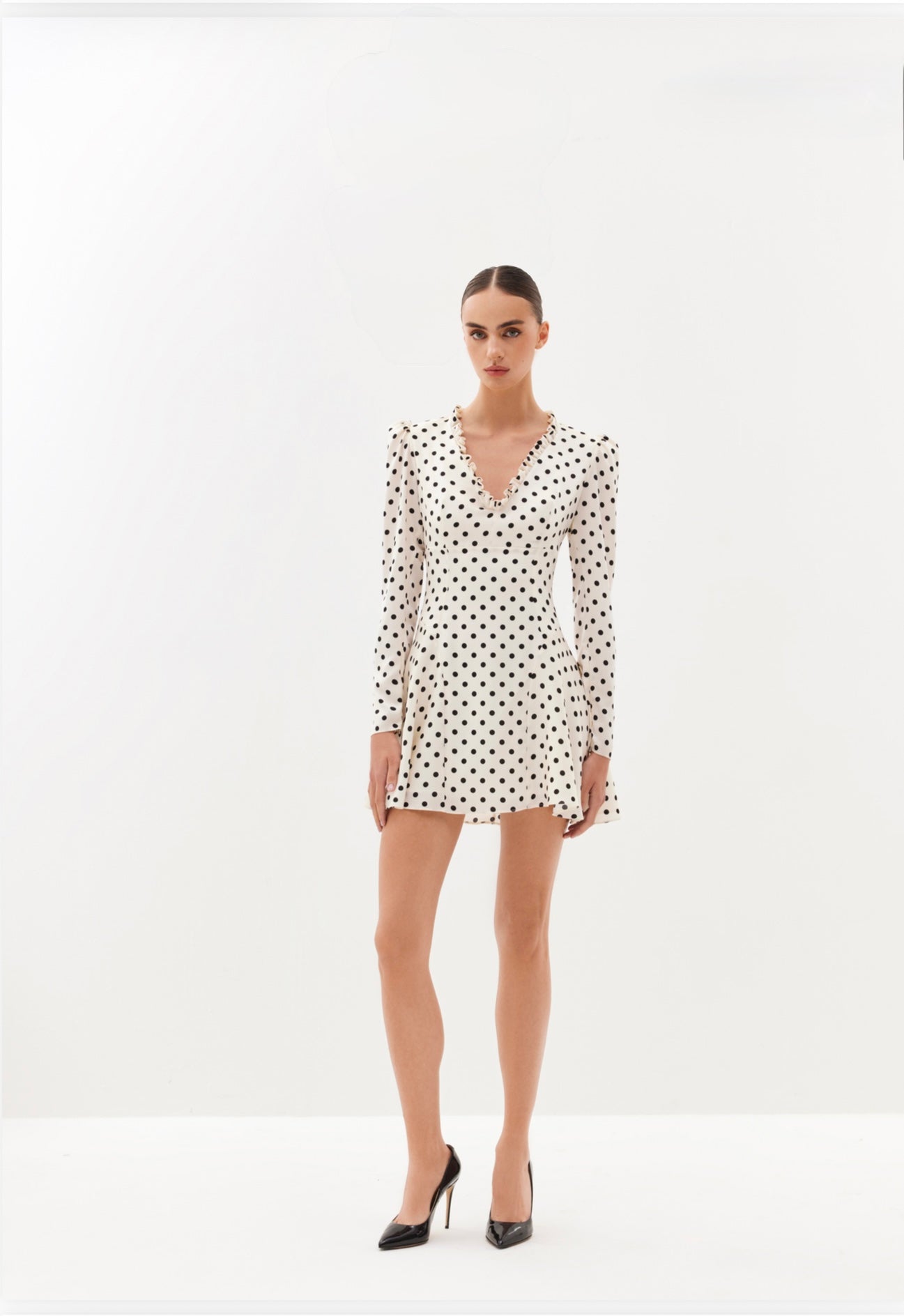 Ivory polka-dot mini dress with V-neckline