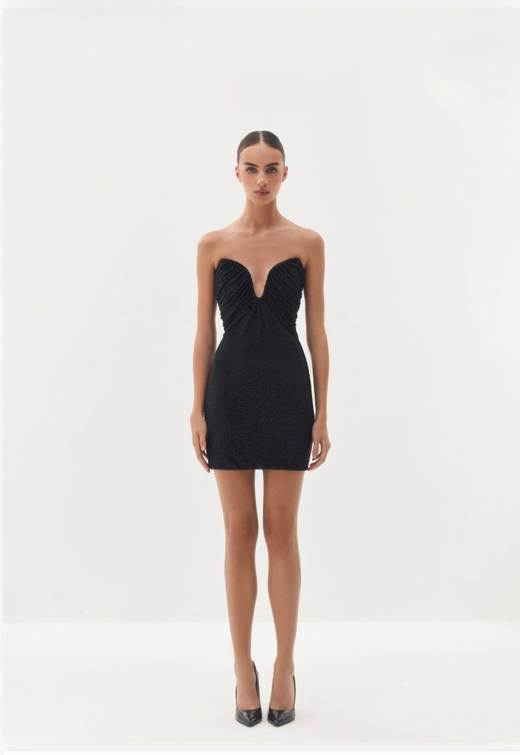 Black strapless mini dress with draped neckline