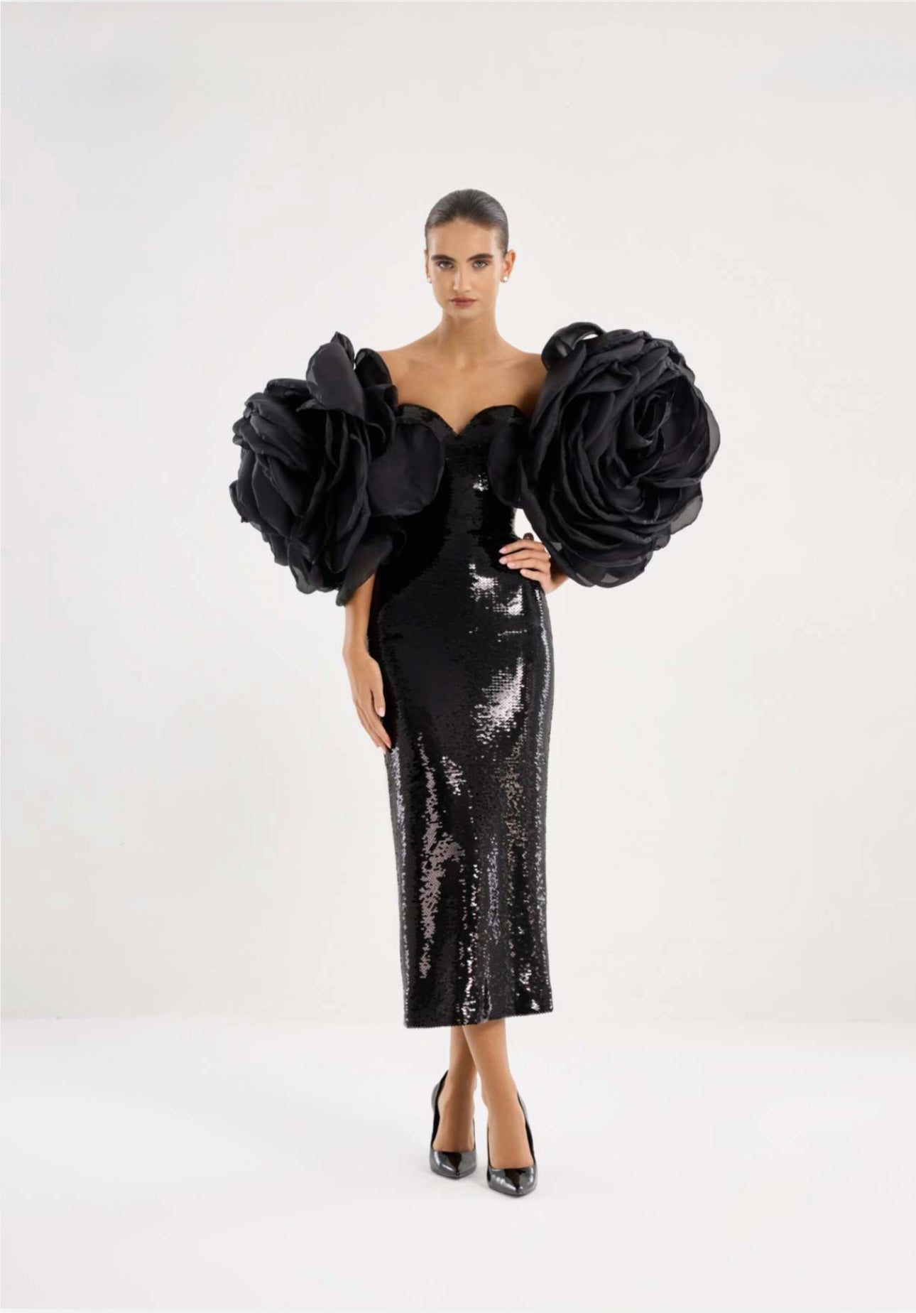 Black sequin midi dress with sculptural floral sleeves