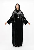 Black velvet maxi dress with embellished fringe neckline